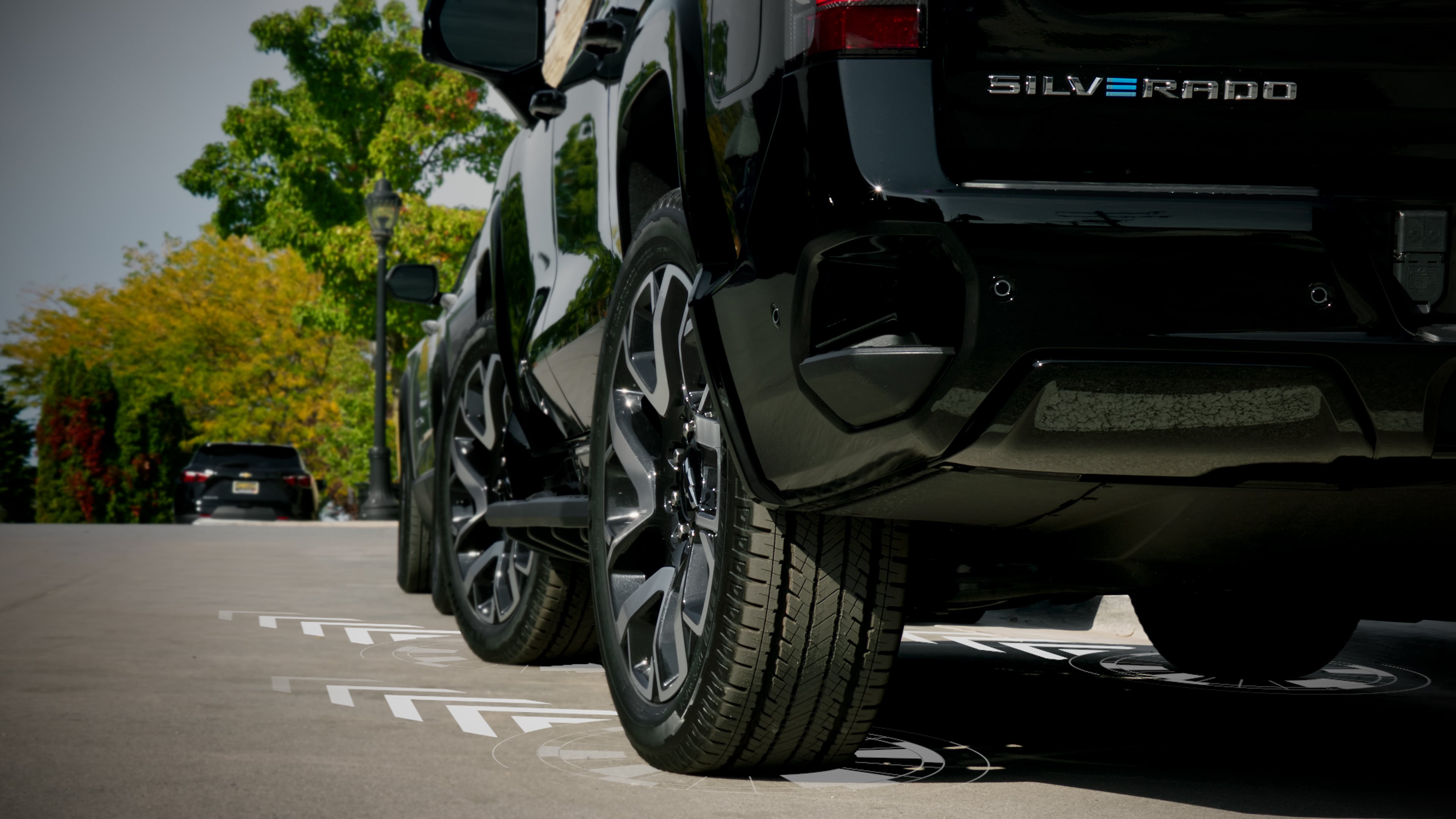 A photo illustration of the 2025 Chevrolet Silverado EV RST showing the wheels turning in the same direction.