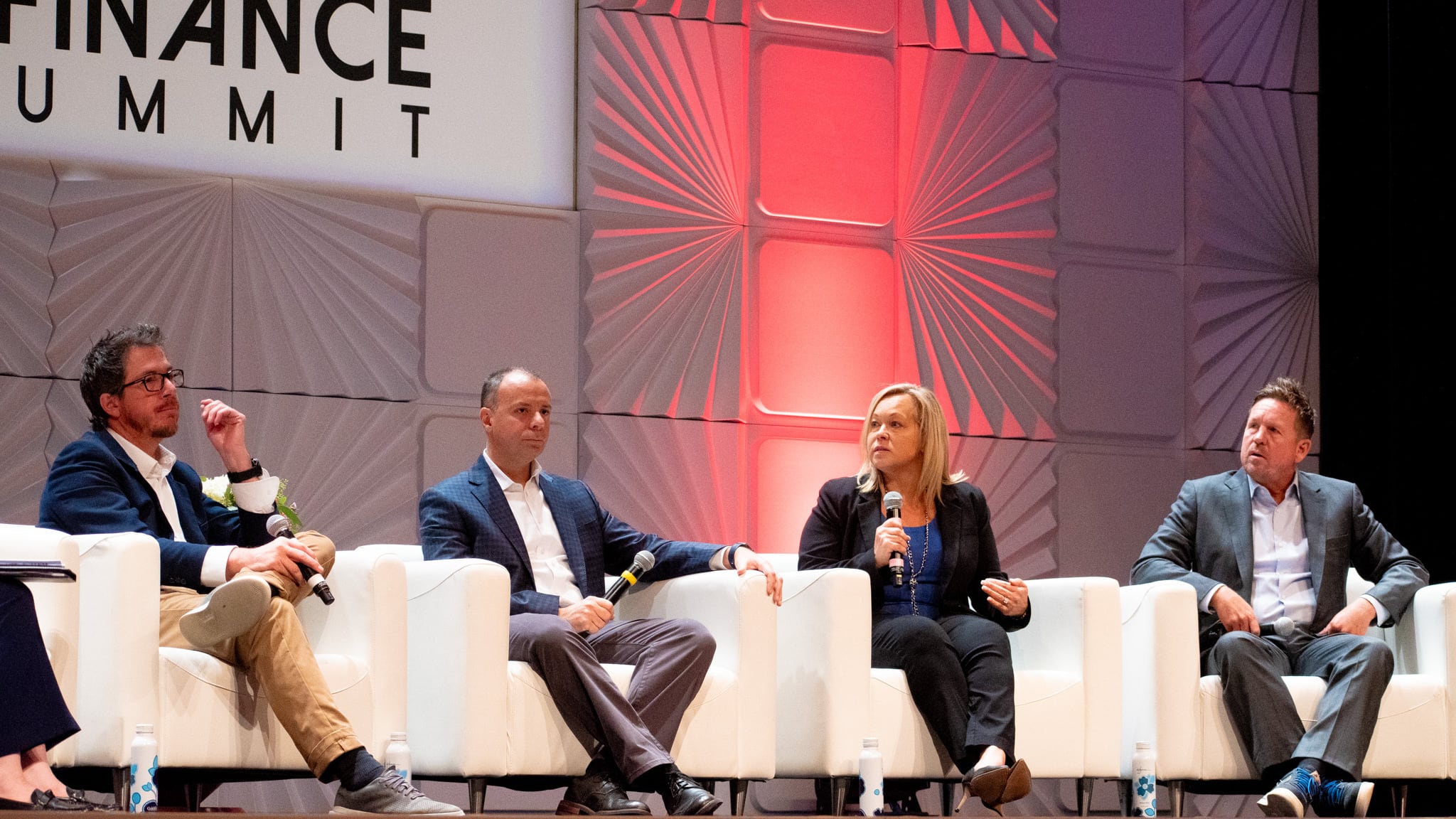 From left, Ian Anderson, Westlake Financial group president; Chase Auto CFO Douglas Arrigo; Betty Jotanovic, Santander Consumer USA president of Chrysler Capital and auto relationships; and Consumer Portfolio Services President Mike Lavin sitting.